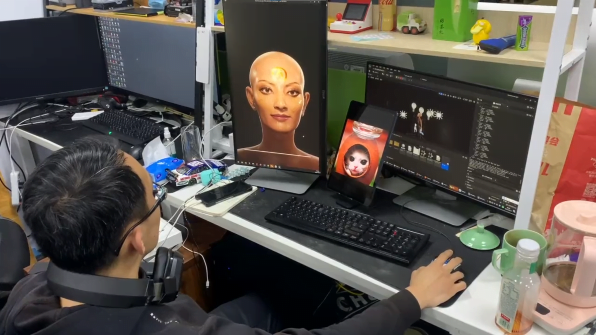 A developer sitting in front of his computer. On the screen is a digital avatar. The developer can speak with the avatar, who then answers and creates images.