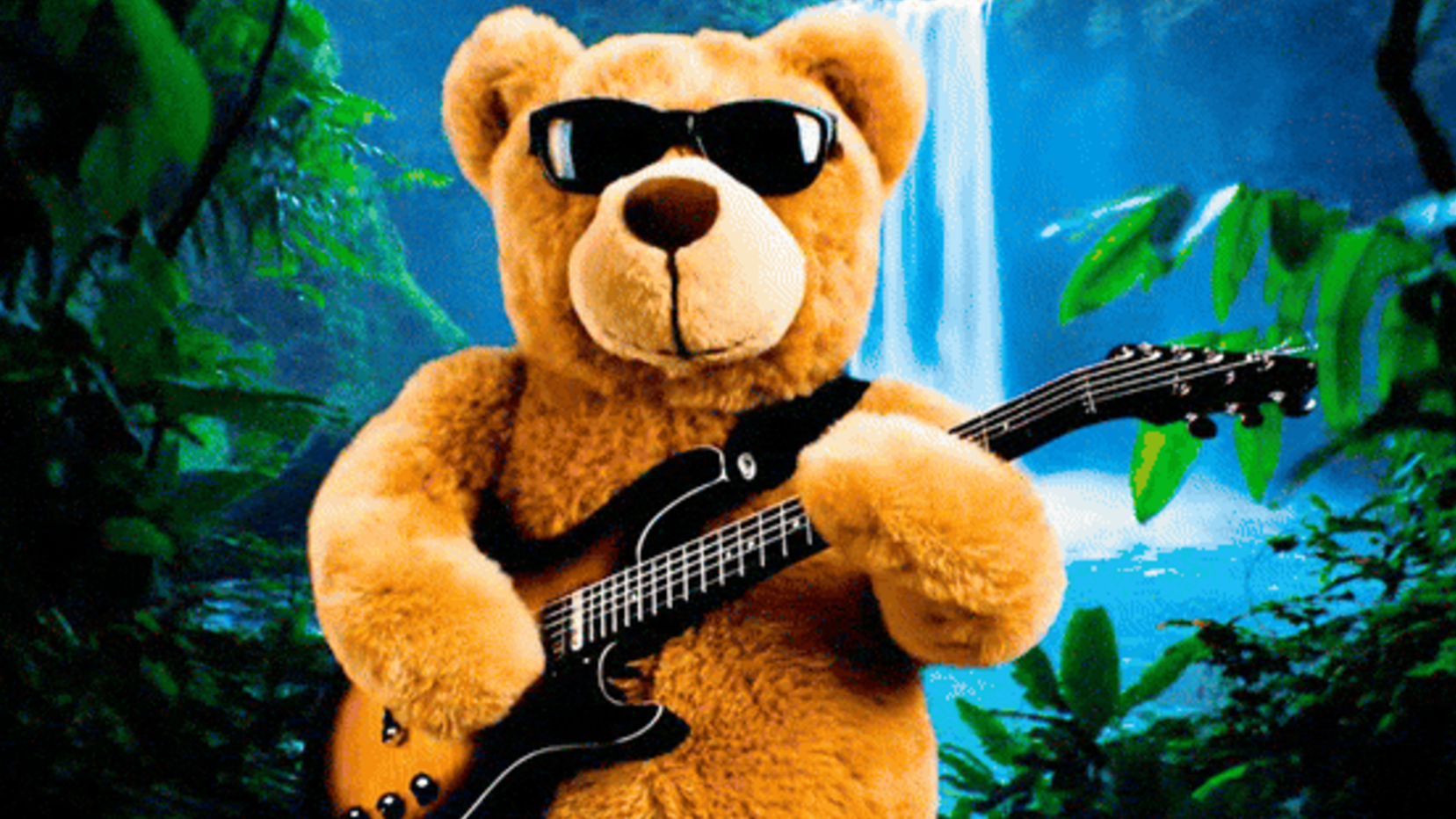 A teddy bear with sunglasses plays the electric guitar.